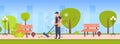 Man cleaner sweeping street from leaves with broom male janitor in uniform cleaning service concept summer park