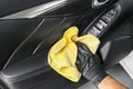 A man cleaning car with microfiber cloth. Car detailing. Valeting concept. Selective focus. Car detailing. Cleaning with sponge. W Royalty Free Stock Photo