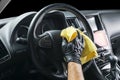 A man cleaning car with microfiber cloth. Car detailing. Valeting concept. Selective focus. Car detailing. Cleaning with sponge. W Royalty Free Stock Photo