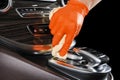 A man cleaning car with microfiber cloth. Car detailing or valeting concept. Selective focus. Car detailing. Cleaning with sponge. Royalty Free Stock Photo