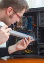 Man cleaning computer Royalty Free Stock Photo