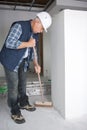 Man cleaning construction site Royalty Free Stock Photo