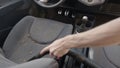 Man cleaning dirty car interior with vacuum cleaner Royalty Free Stock Photo