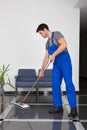 Man cleaning the floor