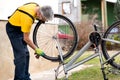 Man cleaning his bicycle for the new season Royalty Free Stock Photo