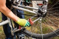 Man cleaning his bicycle for the new season Royalty Free Stock Photo