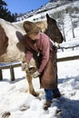 Man Cleaning a Horse Hoof Royalty Free Stock Photo