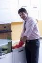 Man cleaning kitchen counter Royalty Free Stock Photo