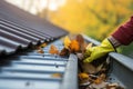 A man cleaning leaves in a rain gutter on a roof. Generative AI