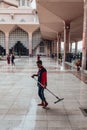 A man is cleaning in Putra Mosque in Wilayah Persekutuan Putrajaya, Malaysia