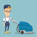 Man cleaning the store floor with a machine. Royalty Free Stock Photo