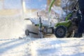 Man cleaning the street from snow manual tractor special Royalty Free Stock Photo