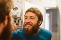 Man cleaning teeth in bathroom