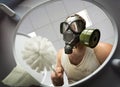 Man cleaning the toilet bowl Royalty Free Stock Photo