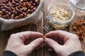 Man cleans roasted peanuts