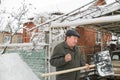 The man cleans snow. Royalty Free Stock Photo