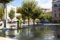 A man cleans a town square after a market in Valence downown