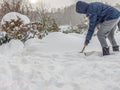 Snow shoveling after heavy snowfall