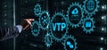 The man clicks on the inscription VTP. VLAN Trunking Protocol. Virtual Local Area Network Royalty Free Stock Photo