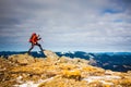 The man climbed to the top of the mountain. Royalty Free Stock Photo