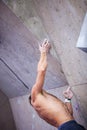 Man climber on artificial climbing wall Royalty Free Stock Photo