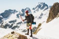Man climber holding ice axe on mountain Travel Lifestyle Royalty Free Stock Photo