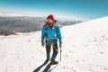 Man climber mountaineering with ice axe in mountains Royalty Free Stock Photo
