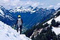 Man Climber Standing on Mountain Top and Enjoying View. Royalty Free Stock Photo