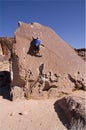 Man climbing boulder Royalty Free Stock Photo