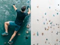 A man climbing in boulder gym in the wall. Royalty Free Stock Photo