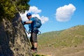 A man climbing a ferrata route in Calcena, Spanish mountains