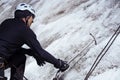 Man is climbing with ice ax on the glacier. Royalty Free Stock Photo