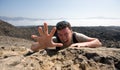 Man climbing a mountain Royalty Free Stock Photo