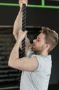 Man climbing the rope