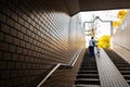 Man climbing stairs with bicycle in Japan Royalty Free Stock Photo