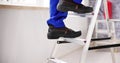 Man Climbing Step Ladder Royalty Free Stock Photo