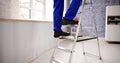 Man Climbing Step Ladder Royalty Free Stock Photo