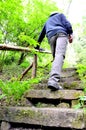 Man climbing a stone stairs