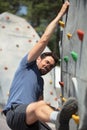 man climbing wall rock outdoors Royalty Free Stock Photo