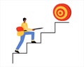 A man climbs the stairs. A man with a dart in his hands goes to the target. Career development concept Royalty Free Stock Photo