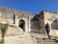 A man climbs the steps to the Tangier kasbah