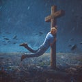 Man clinging to cross Royalty Free Stock Photo