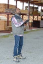 Man with clipboard in woodyard Royalty Free Stock Photo