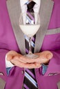 Man close purple suit drink on hands