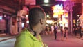 Man close up look caucasian at Pattaya Walking Street with wearing protective medical mask. Lockdown quarantine
