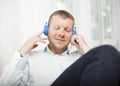 Man closing his eyes as he listens to music Royalty Free Stock Photo