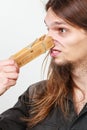 Man with clothespin on nose