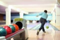 Man in club for bowling throw ball