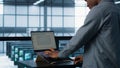 Man coding on data center, testing failover scenarios using notebook Royalty Free Stock Photo