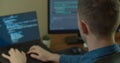 Man coding html and programming on screen Monitors, development web, developer. Royalty Free Stock Photo